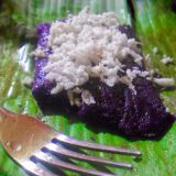 มัน's bright purple, it's made using bamboo, it's a Christmas dessert? In the Philippines, it is. Puto bumbong, a rice cake made of rice cooked in bamboo tubes before it's steamed, gets its color from the mixture of sweet and black rice. Once cooked, it's usually topped with butter, sugar, and grated coconut. 