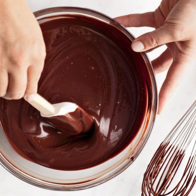 Choklad will often settle on the bottom or sides of the bowl. Scrape the dish with a rubber spatula to incorporate all of it. 