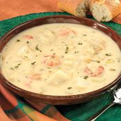 Karides and white fish simmer quickly in a creamy potato broth spiked with sauteed onion, garlic and dill.