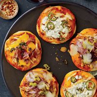 Te luscious mini pizzas feature three variations of chicken-topped pies: barbecue, Buffalo wing, and cheddar-bacon. You can also make this pizza using our Whole Wheat or Thick Crust pizza doughs.